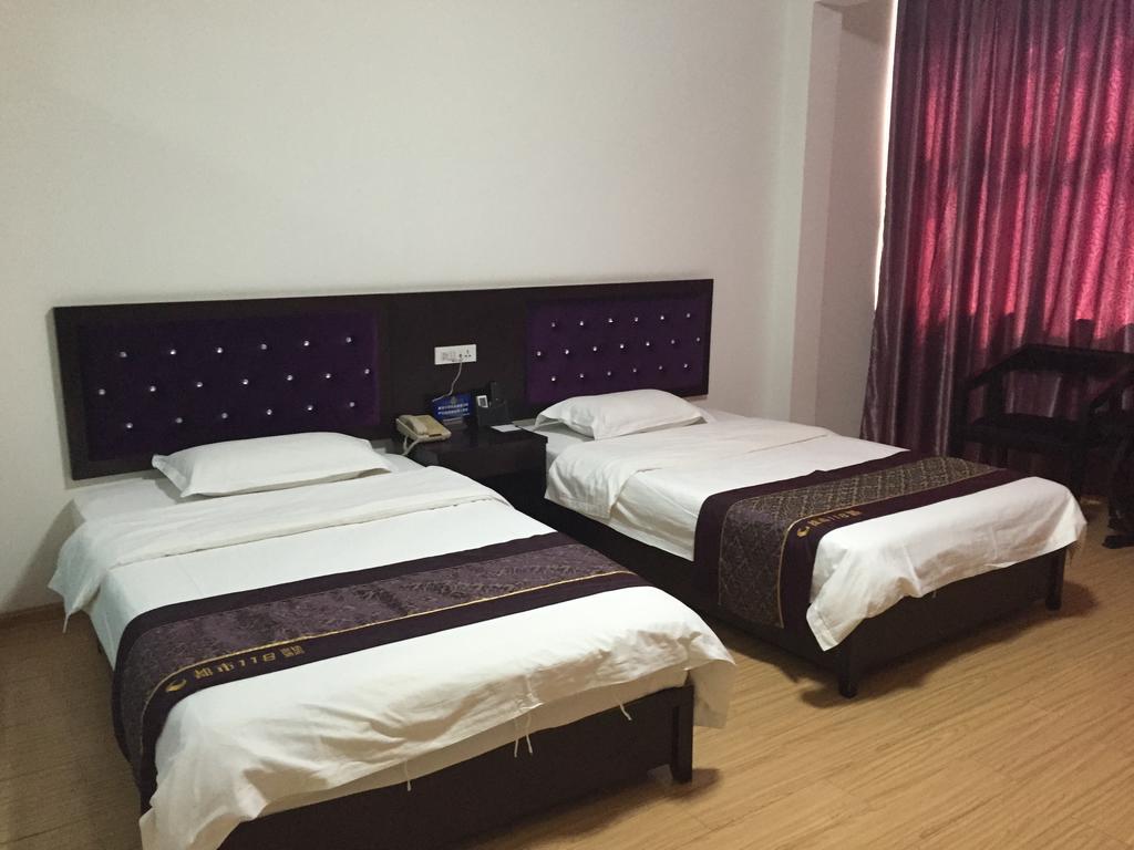 City 118 Inn Kujlin Szoba fotó